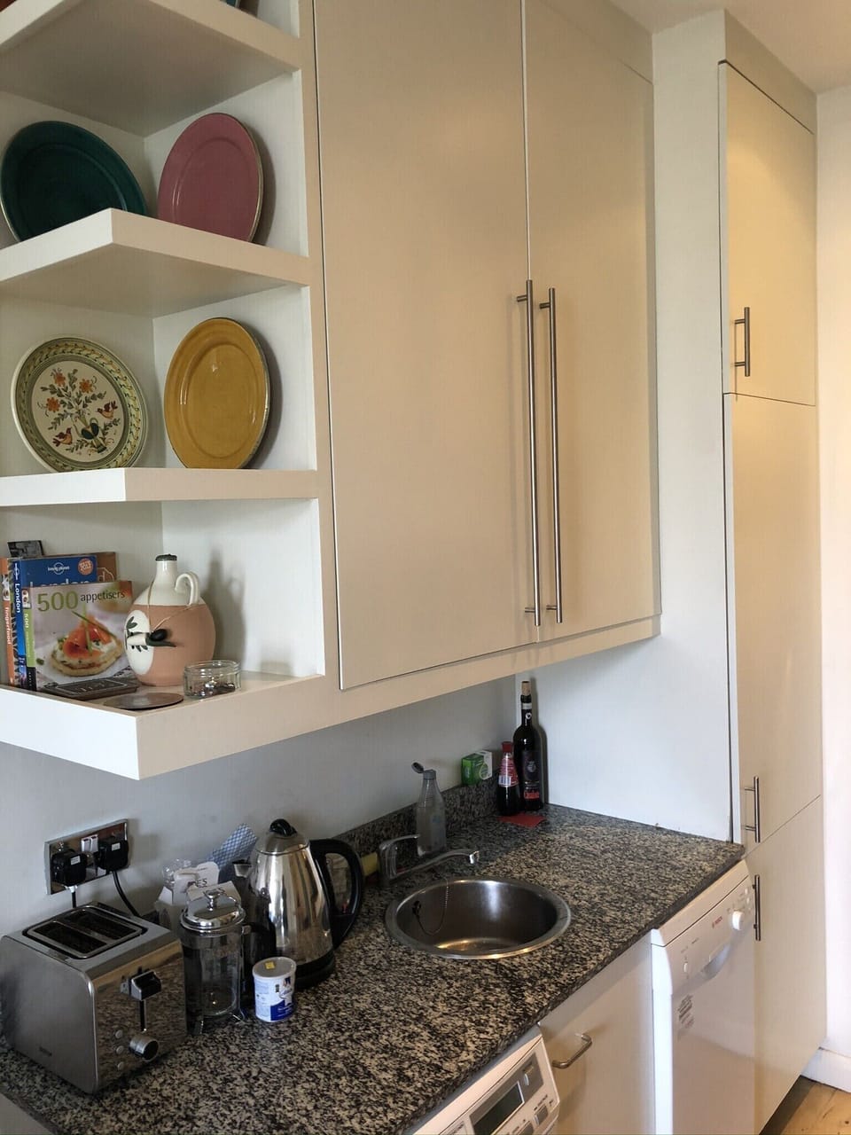 Kitchen - including some Greek and Moroccan decorative plates from my travels. 