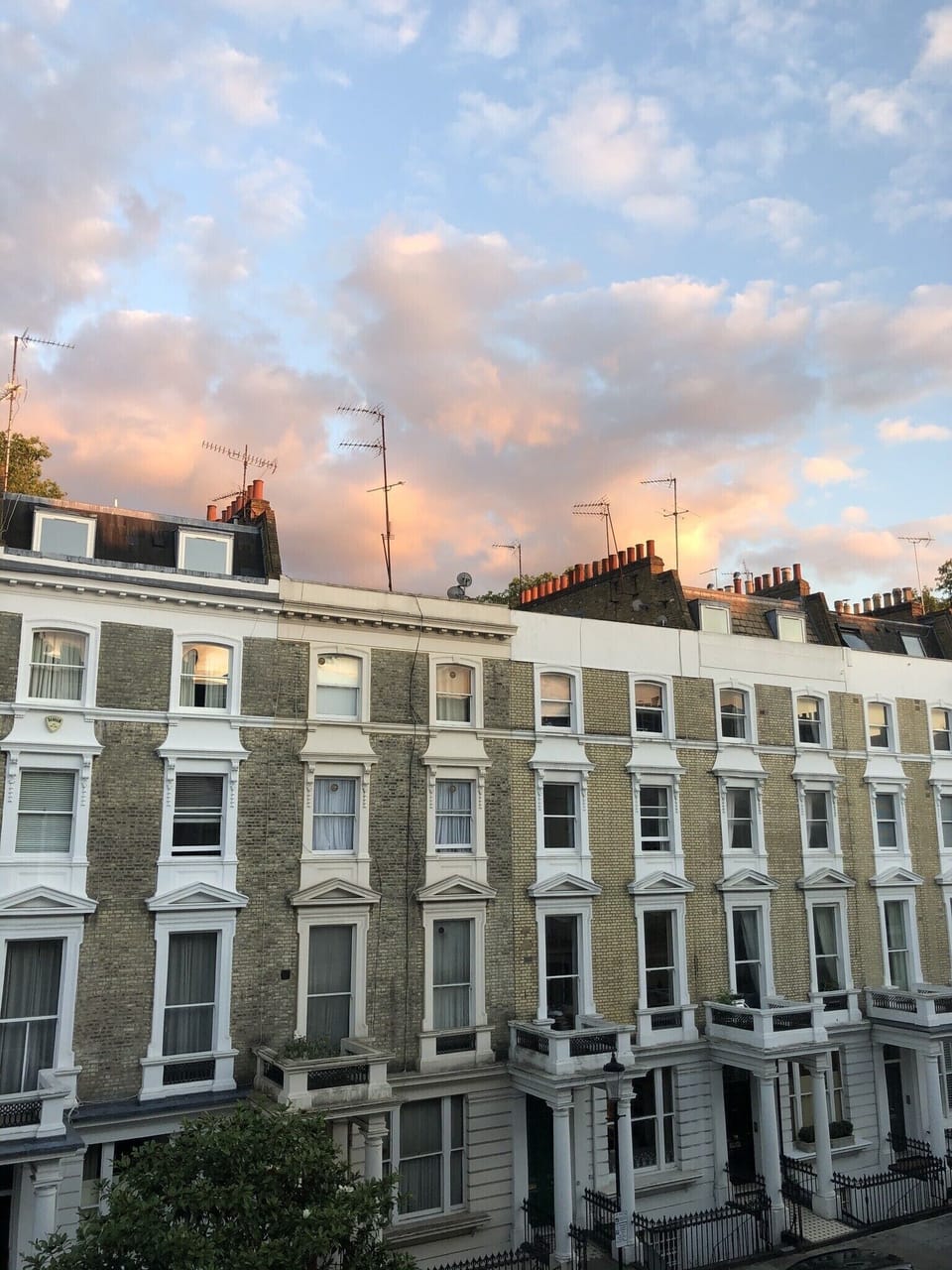 Wider shot across the street from the bedroom window. Classic London charm. 