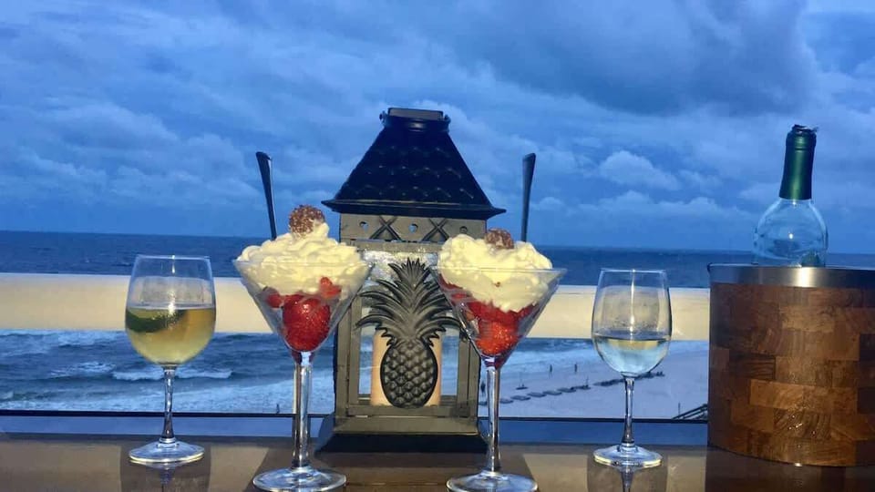 Imagine enjoying a dessert on this balcony overlooking the waves