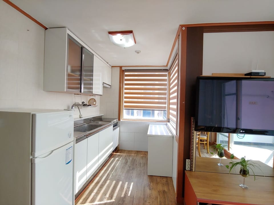 Double + 2 Single Beds (approx. 62 sqm) | Private kitchen | Full-size fridge, microwave, rice cooker, cookware/dishes/utensils