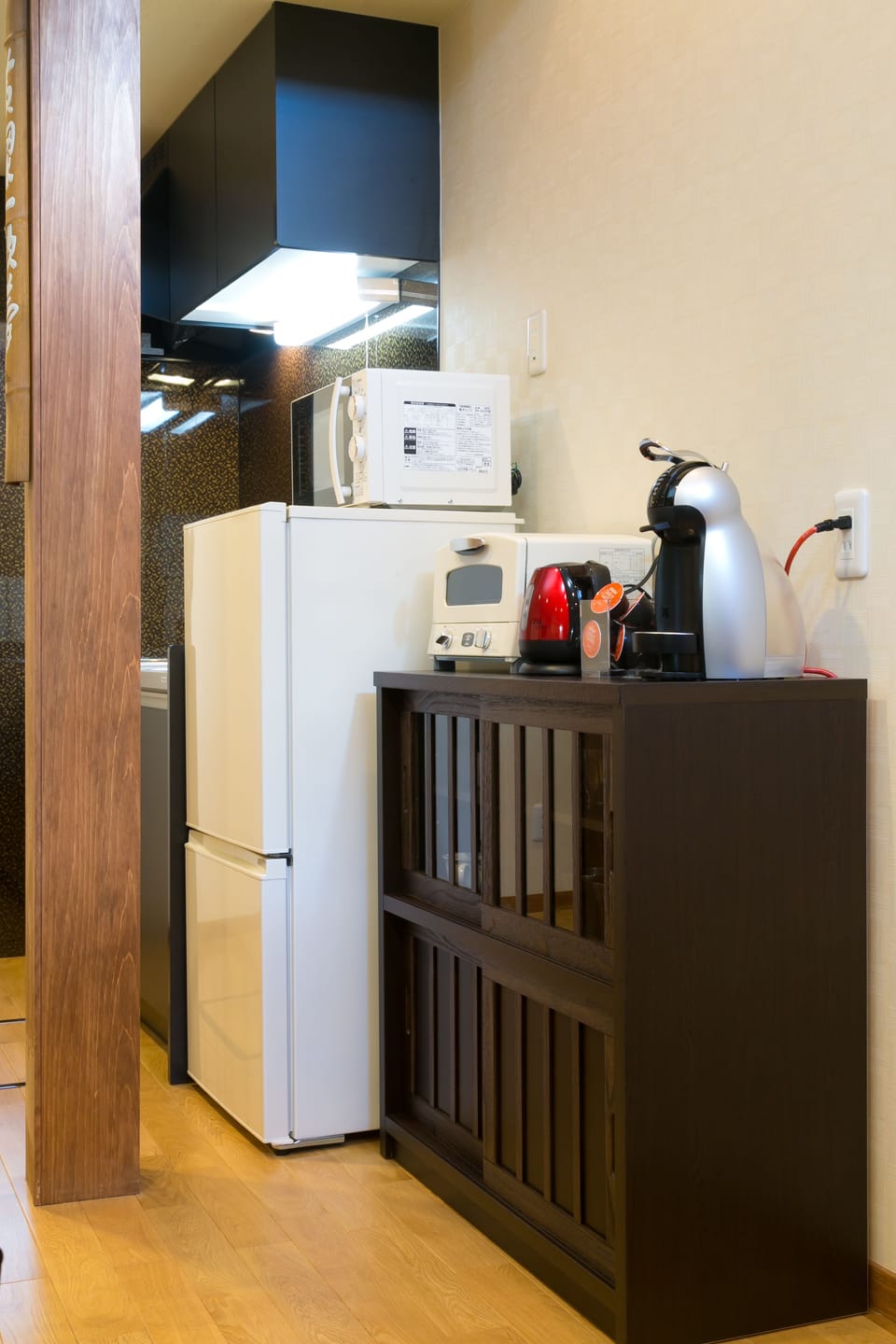 Fridge, microwave, electric kettle, cookware/dishes/utensils