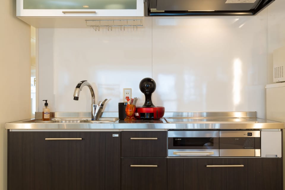 Townhome | Private kitchen | Fridge, microwave, stovetop, coffee/tea maker