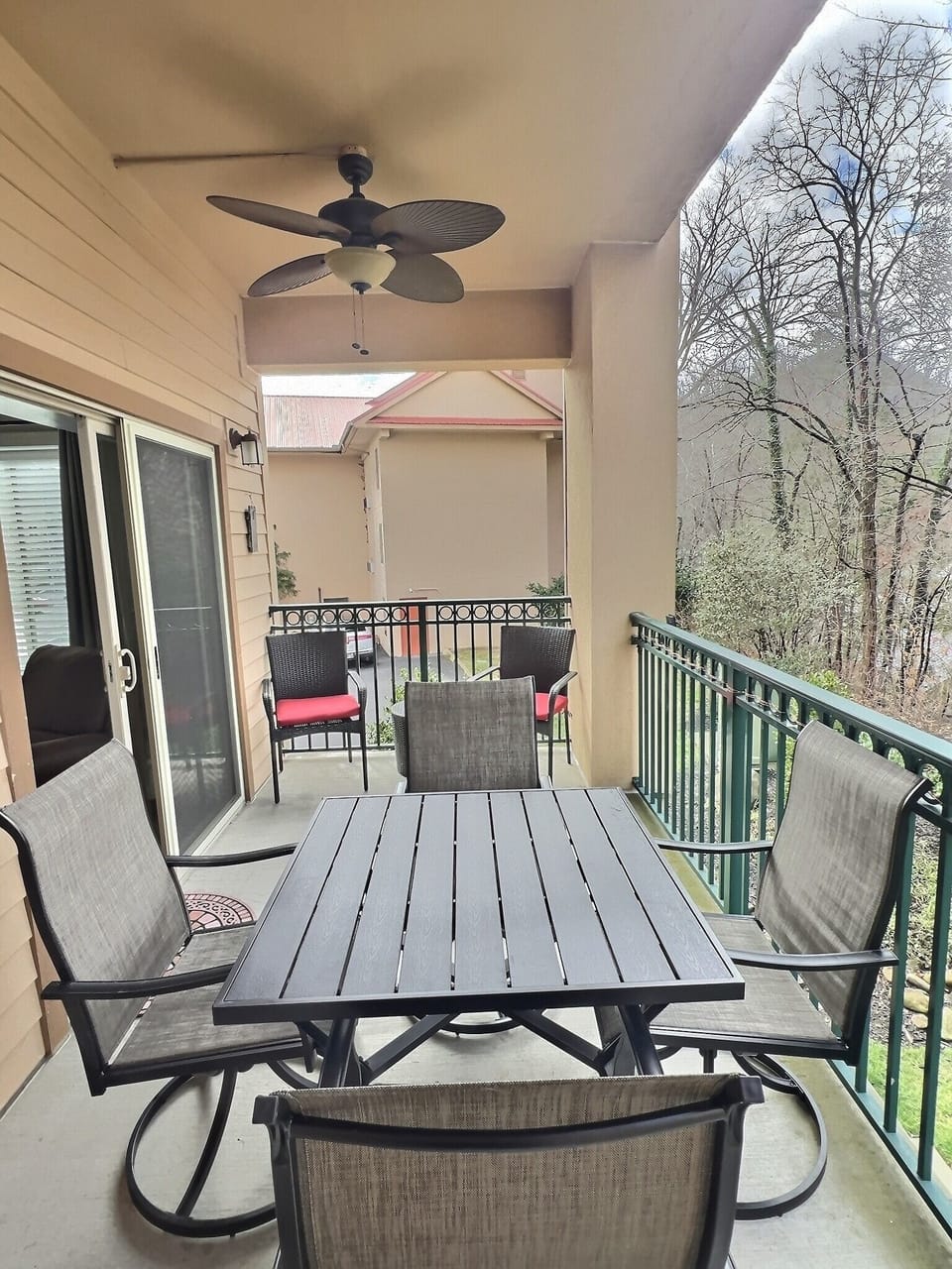 Balcony off of the living room. Seating for 6