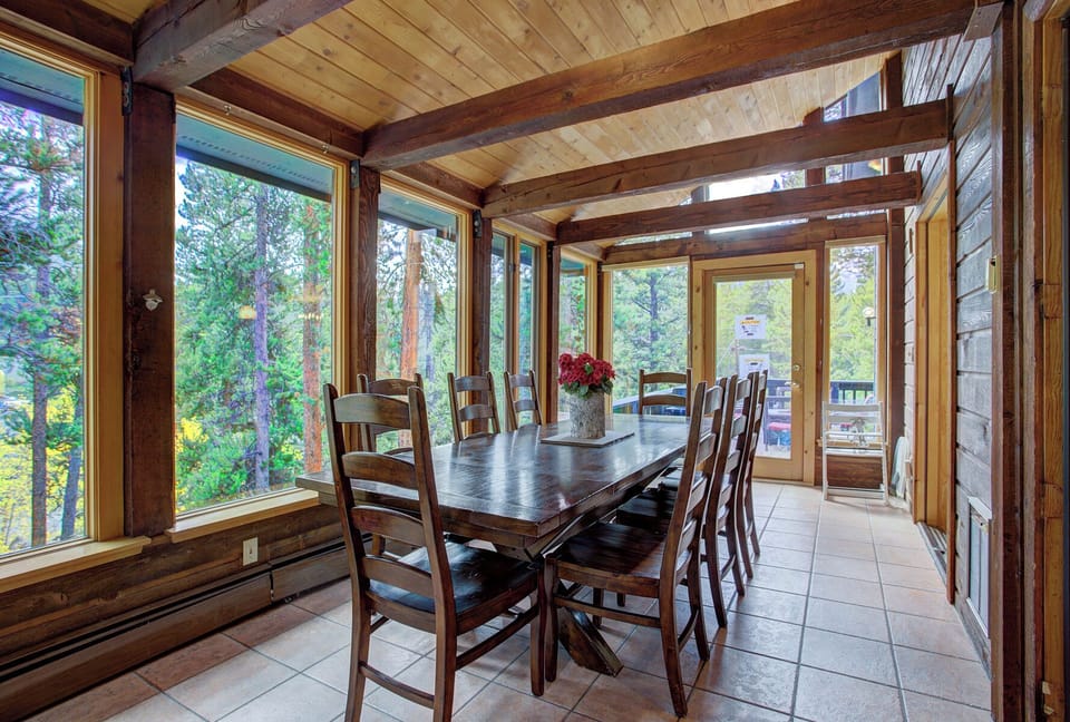 Sun-Drenched Dining Room with beautiful wooded views.