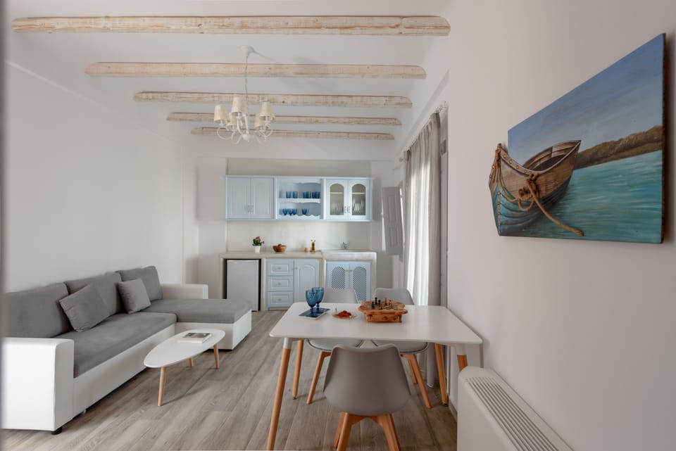 Apartment, 1 Bedroom (Morpheas) | Living area | 32-inch flat-screen TV with satellite channels, TV