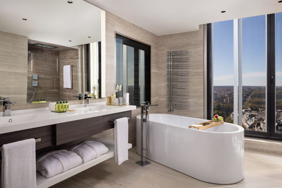 Combined shower/tub, hair dryer, bathrobes, slippers