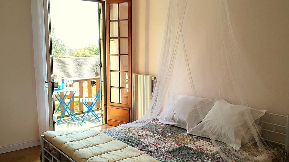 Bedroom 4 with balcony and Emperor sized bed.