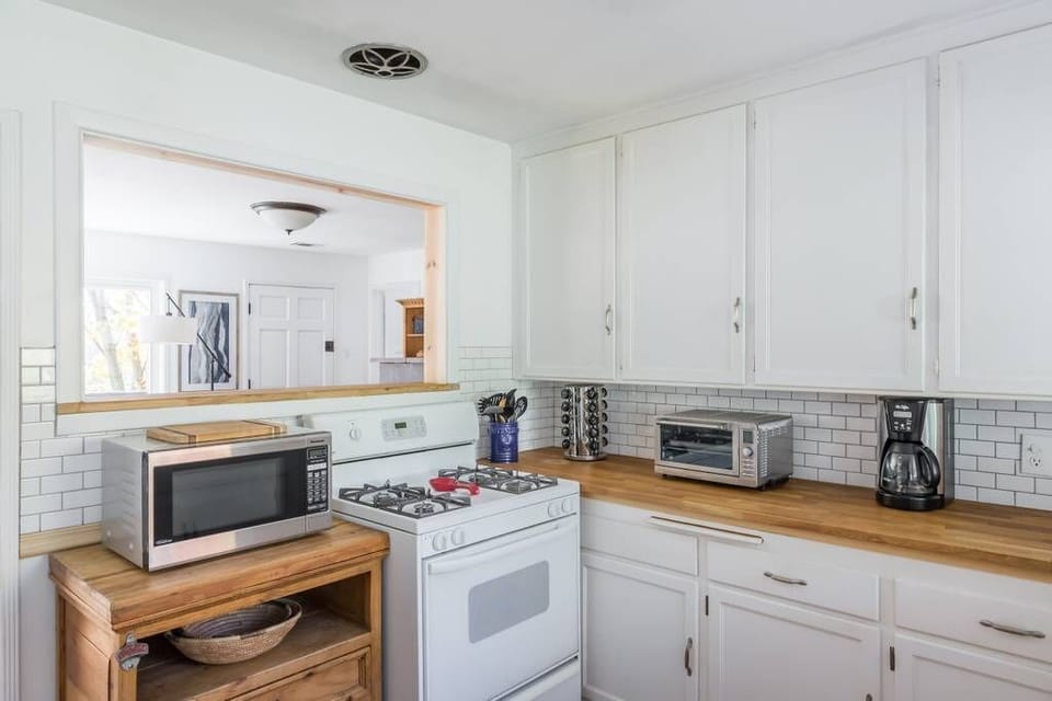 Kitchen with view of the lake, butcher block countertop