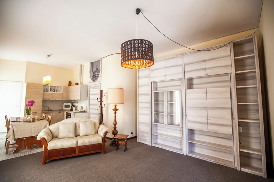 Exclusive Apartment, 1 Bedroom, Lake View | Living area | 24-inch flat-screen TV with digital channels, TV