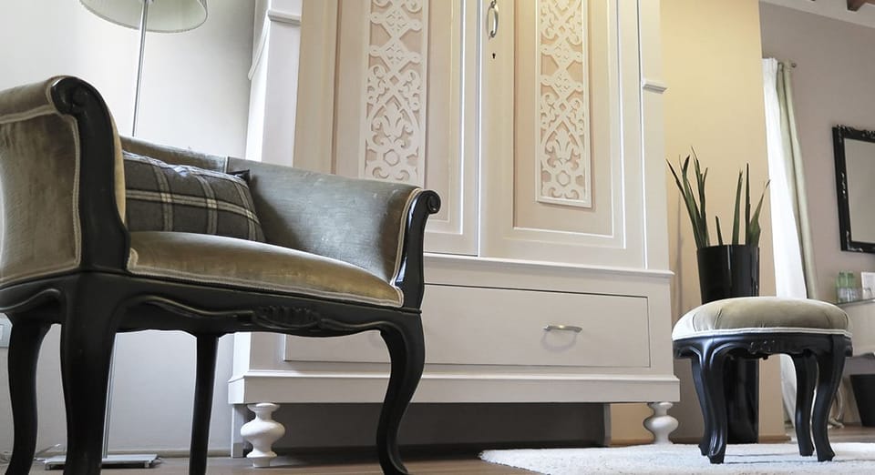 Deluxe Double Room | Living area | Flat-screen TV