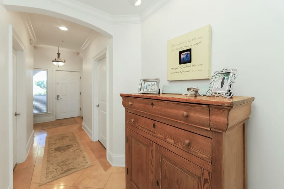 Hallway to entry door at Adagio D405