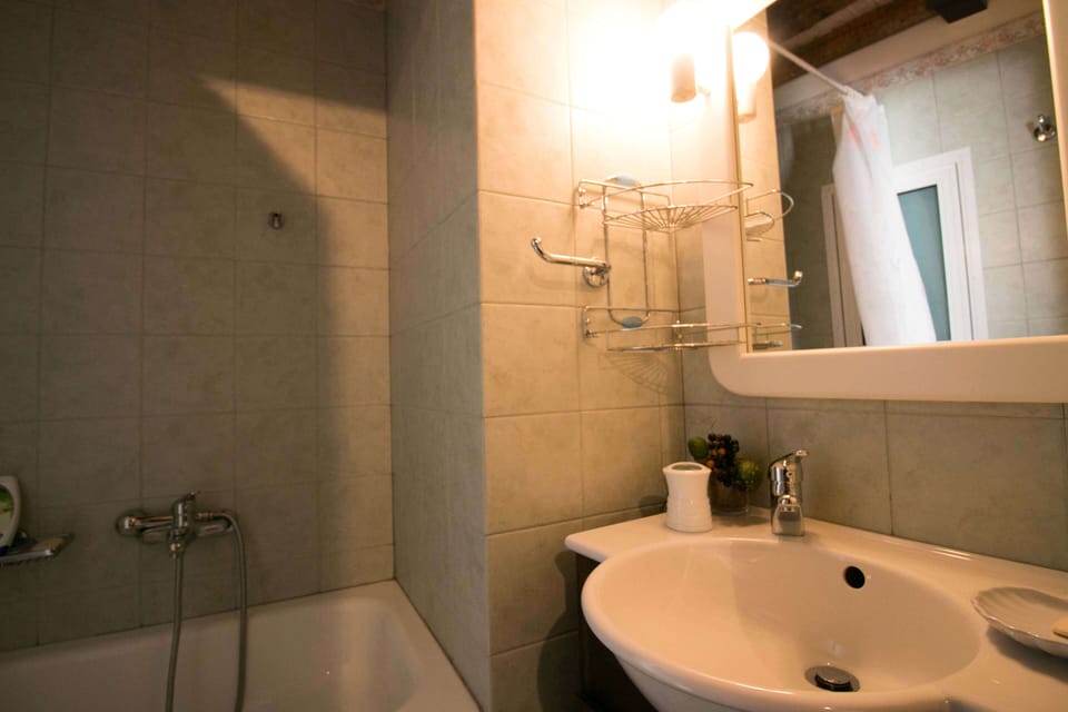 Ground floor private bathroom with WC, left-hand side room