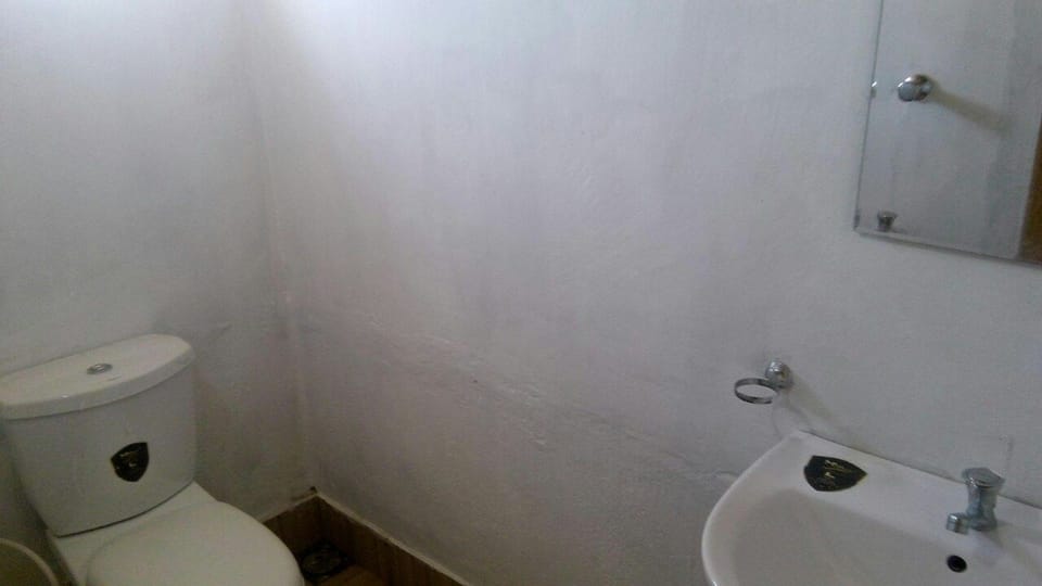 Basic Triple Room, 2 Double Beds, Garden View | Bathroom | Shower, towels