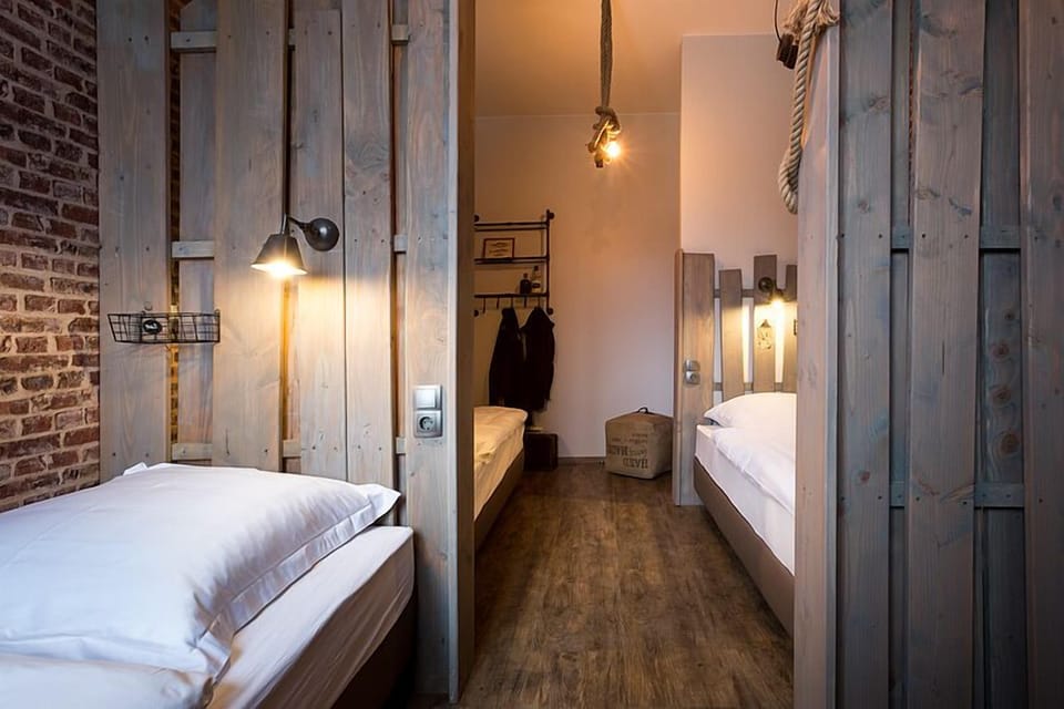 Shared Dormitory, Mixed Dorm, Shared Bathroom (1 bed in a 3-bed dormitory) | Premium bedding, pillowtop beds, in-room safe, individually decorated