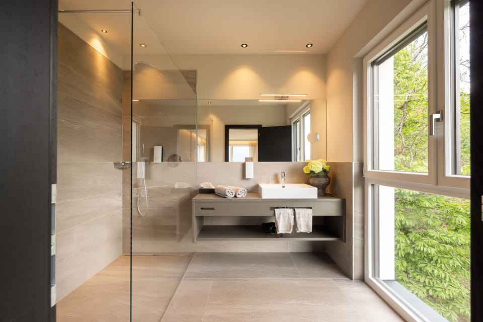 Double Room | Bathroom | Shower, hair dryer, bathrobes, towels