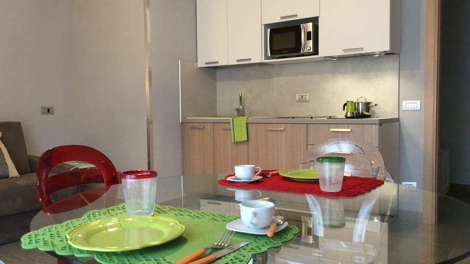 Apartment, 1 Bedroom | Living room | Flat-screen TV
