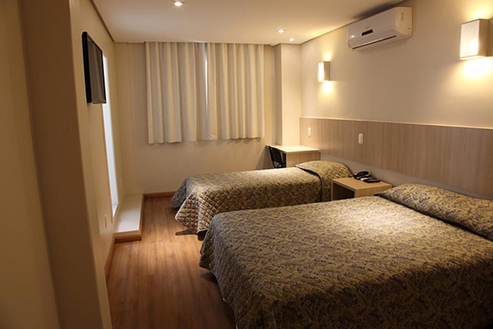 Minibar, desk, blackout drapes, soundproofing