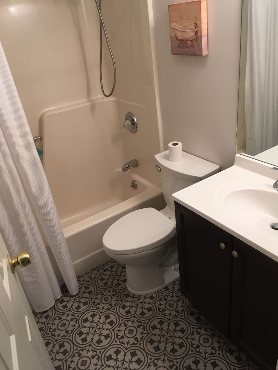 Newly remodeled bathroom. New floor, vanity, toilet. 