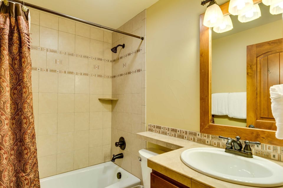 The bathroom just outside the door of the queen-sized bedroom on the first floor