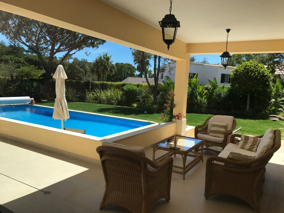 Terrace overlooking pool and gardens