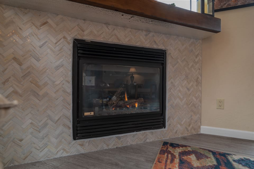 The gas fireplace for ambiance and heat. It has been newly renovated.