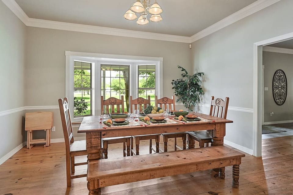 Gather around this spacious wooden dining table—perfect for family feasts or game nights!