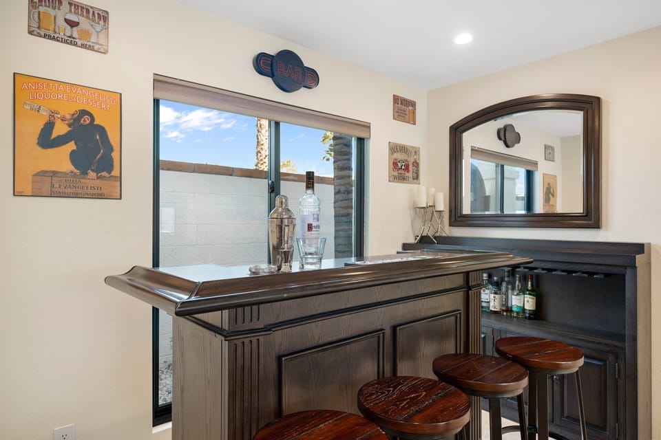 Shake up some cocktails at very own bar in the billiards room!