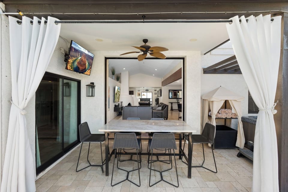 dine outdoors with friends and family and enjoy the covered patio.
