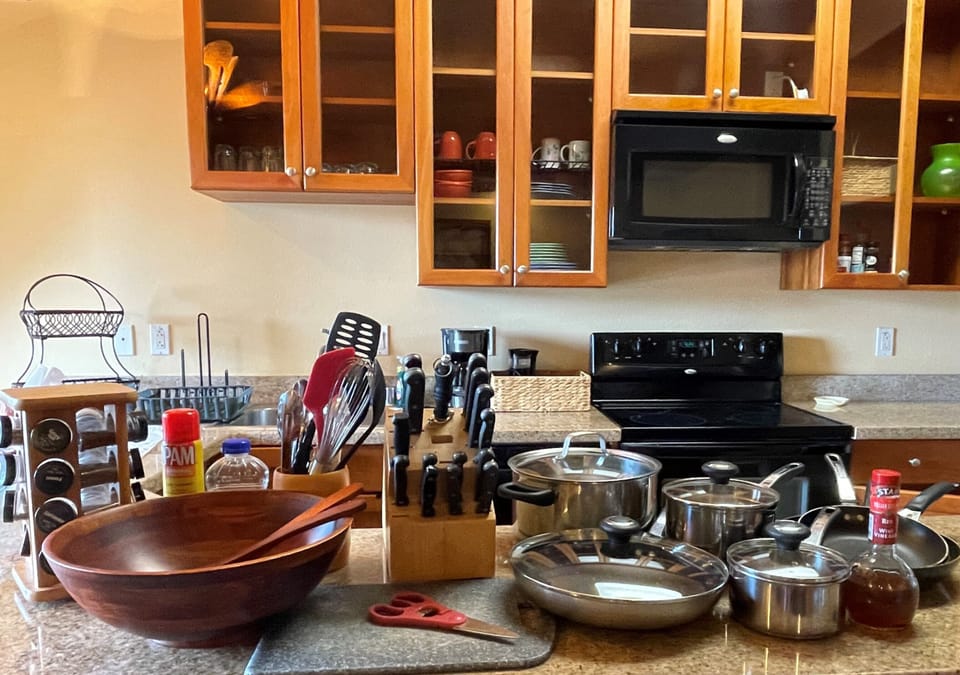 Fully Stocked Kitchen with Pots & Pans, Cutlery, Spice Rack, and Much More.