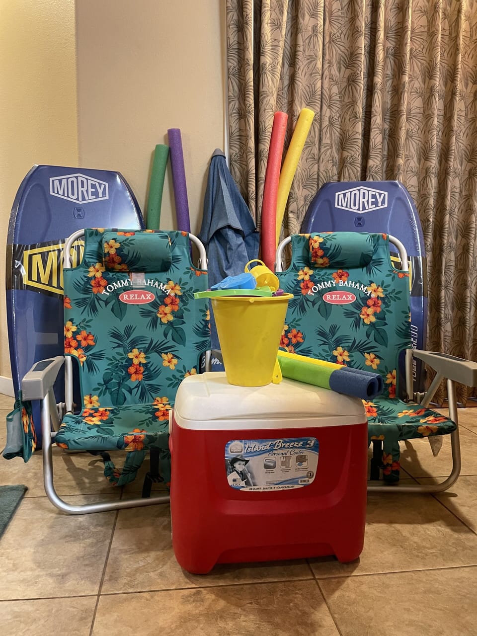 Complimentary Boogie Boards, Beach Chairs, Umbrella, Ice Box & Sand Toys.