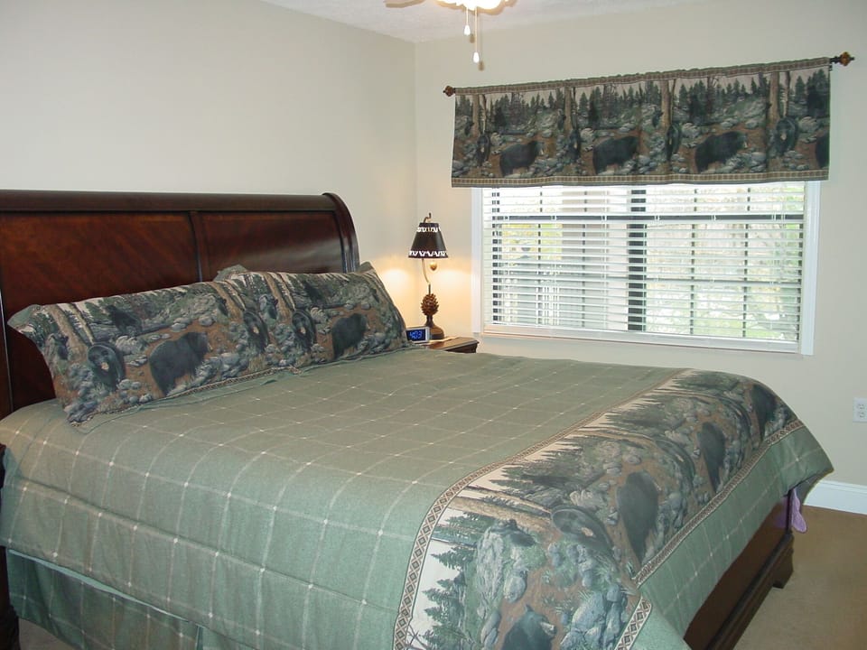 Master Bedroom with  Views and sounds of the creek right outside your window