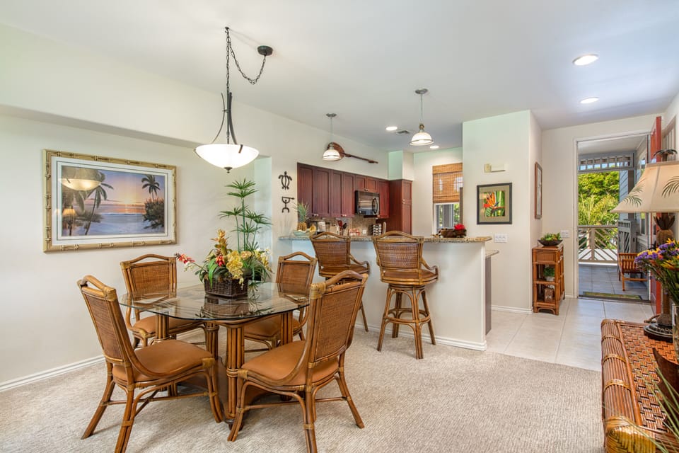 Dining area with view to the breakfast bar and kitchen