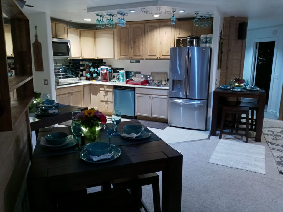 Another view of kitchen and dining.