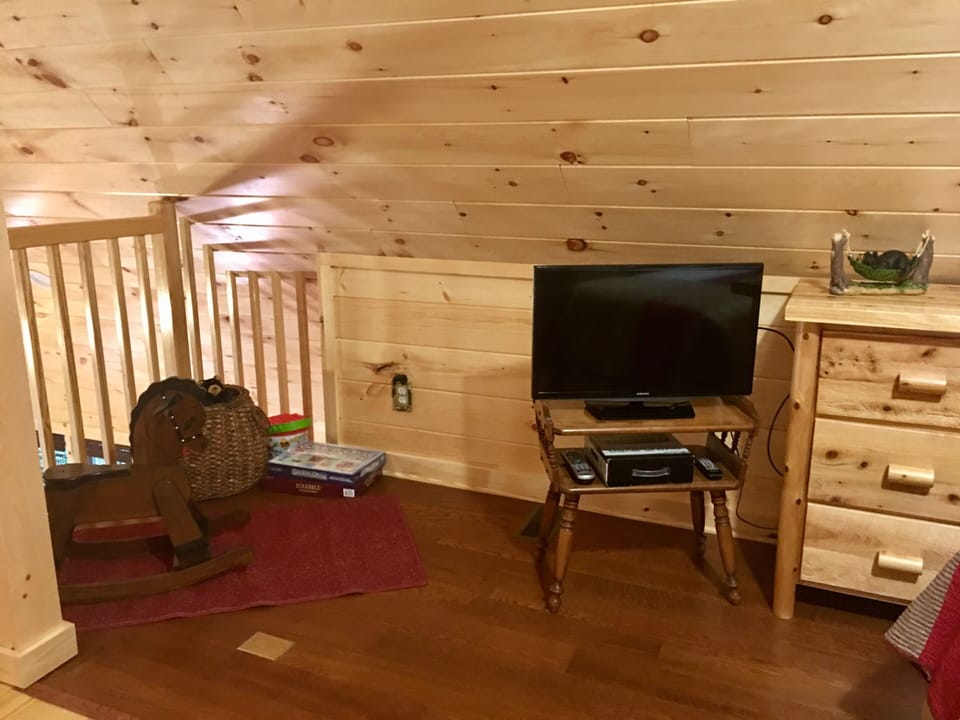 Loft area TV with games and Toys