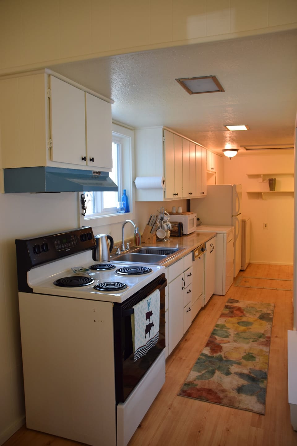 Simple kitchen with all the basics.  Washer/Dryer here as well.