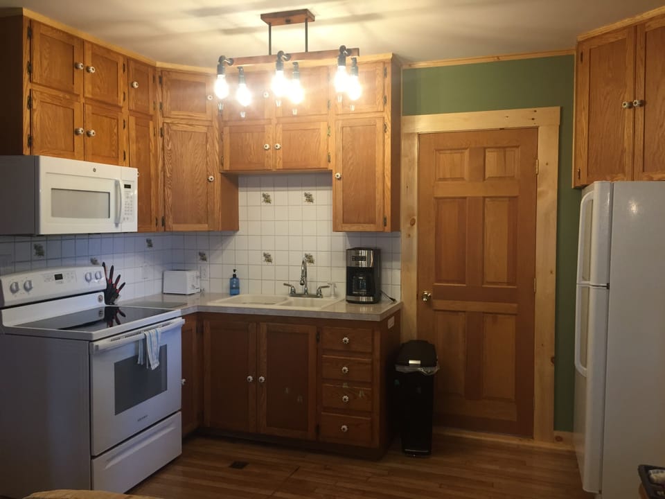fully stocked kitchen with new appliances