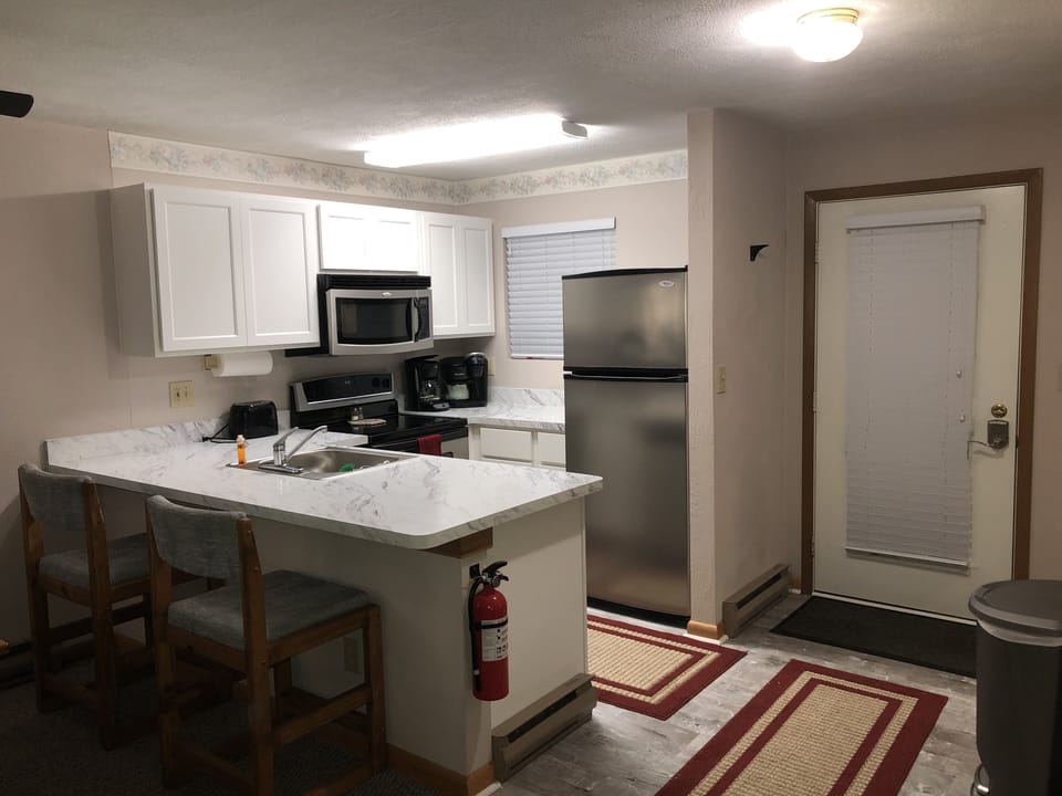 Kitchen - Refrig. w/ ice maker, Elec Stove/MW, DW, toaster, coffee maker & more