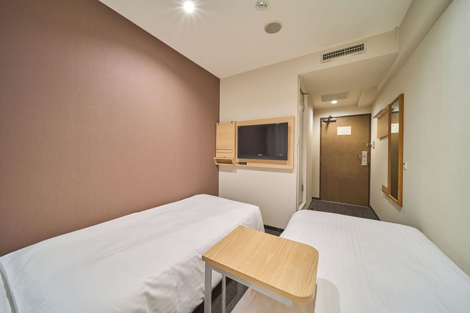 Down comforters, iron/ironing board, free WiFi, bed sheets
