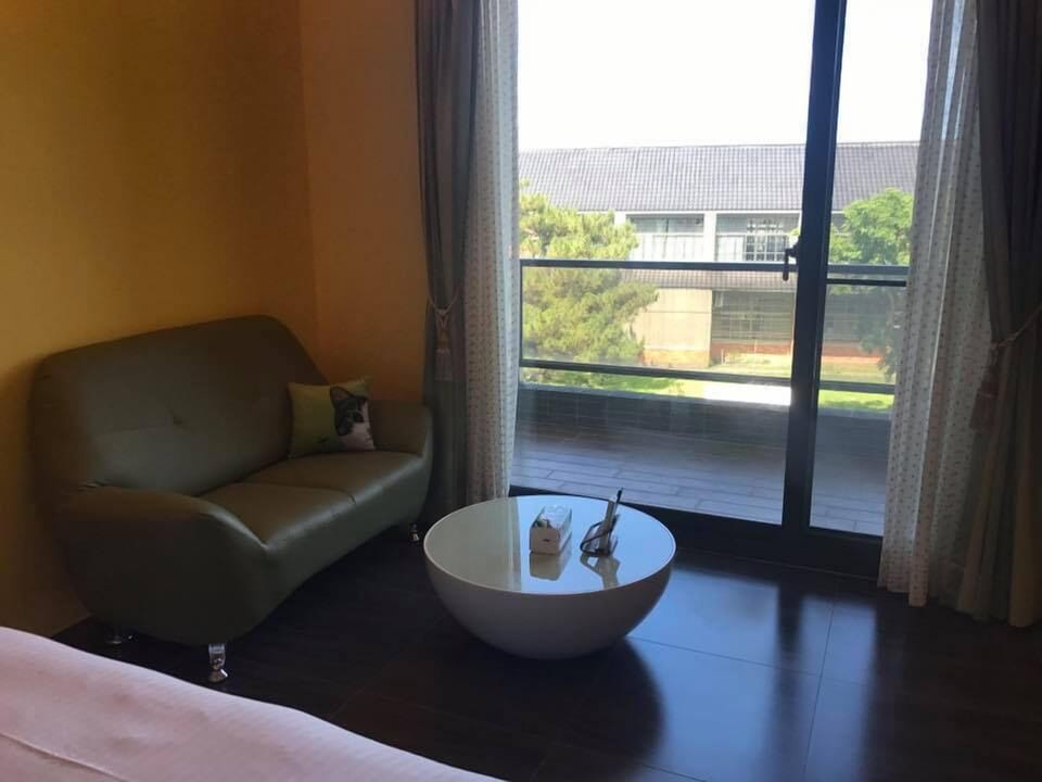 Deluxe Double Room (Mint Ball) | Living area | LCD TV