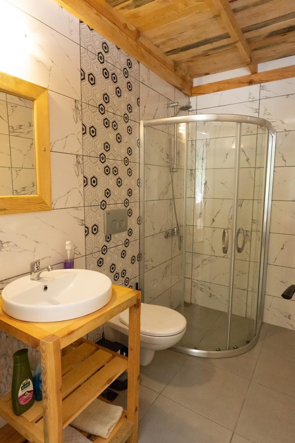 Shower, free toiletries, hair dryer, slippers