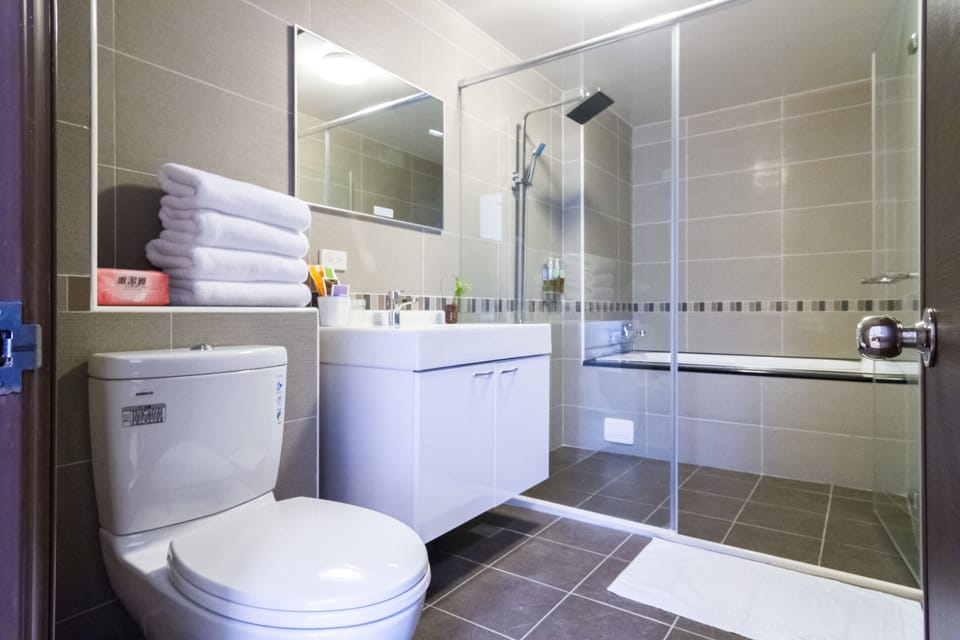 Shower, free toiletries, hair dryer, slippers