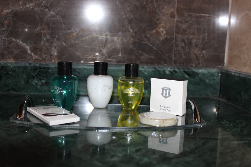 Shower, free toiletries, hair dryer, slippers