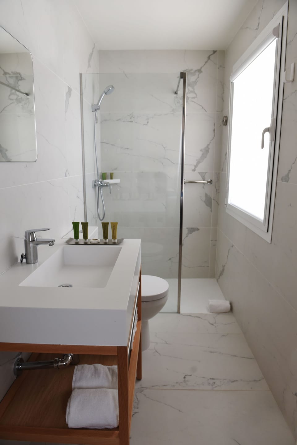 Shower, free toiletries, hair dryer, towels