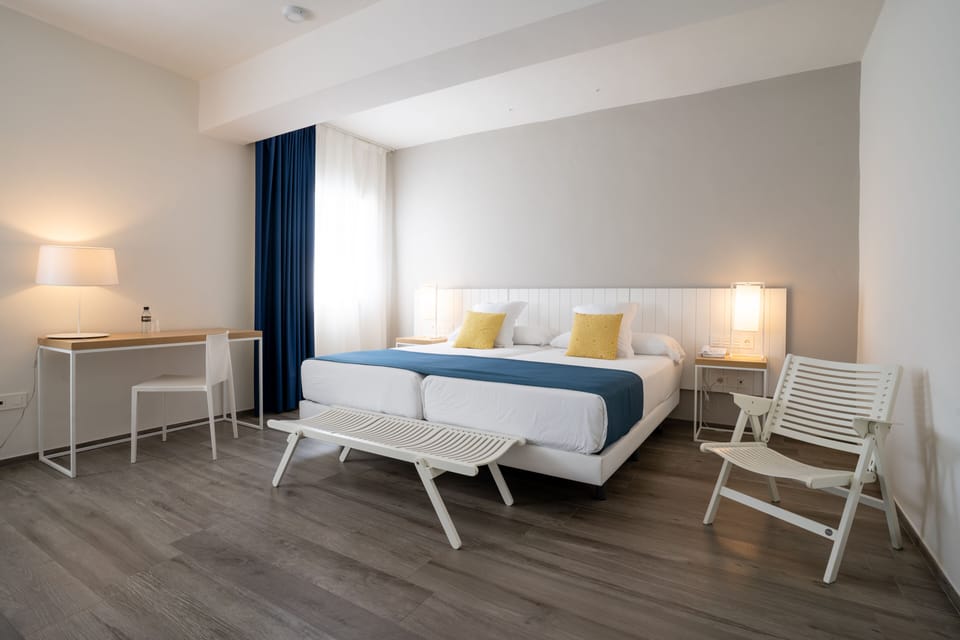 Standard Double or Twin Room | Minibar, in-room safe, desk, blackout drapes