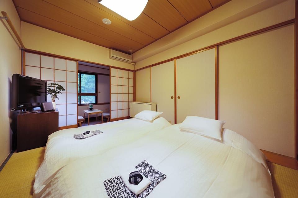 Room (Western-Japanese Room) | Cribs/infant beds, free WiFi, bed sheets