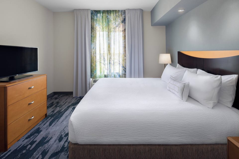 Premium bedding, down comforters, desk, blackout drapes