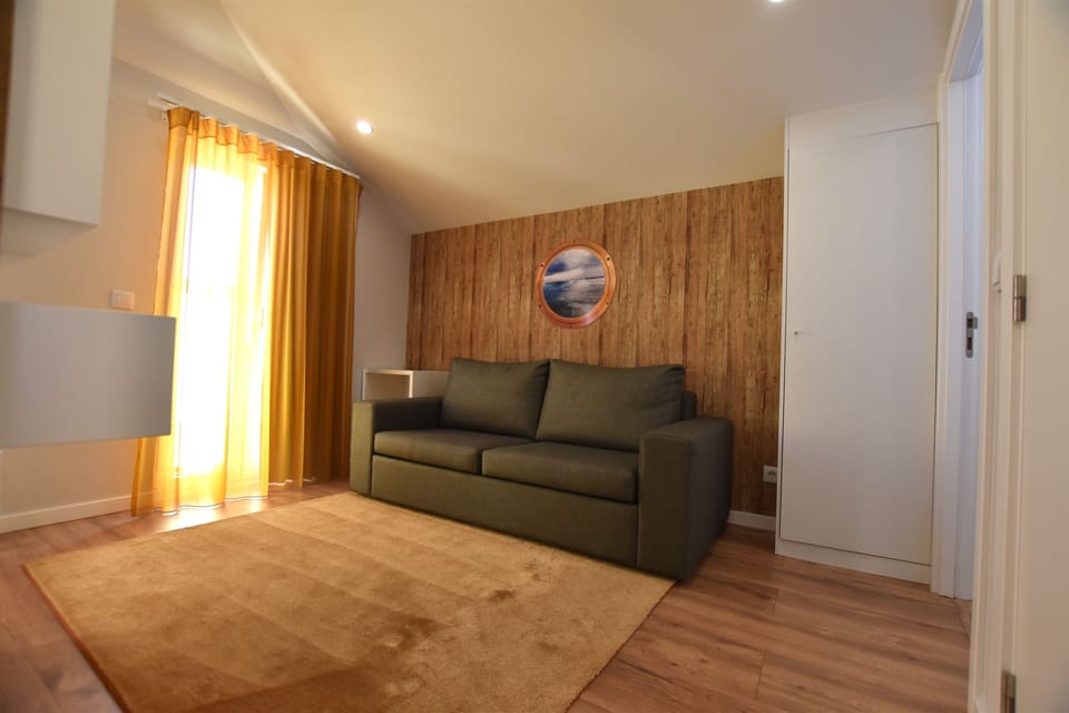 Junior Suite, Balcony | Living area | Flat-screen TV