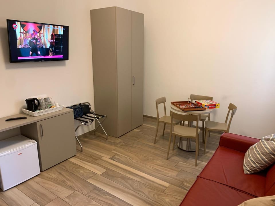 30-inch flat-screen TV with cable channels, TV