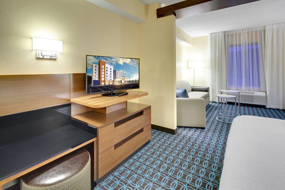 Hypo-allergenic bedding, desk, laptop workspace, iron/ironing board