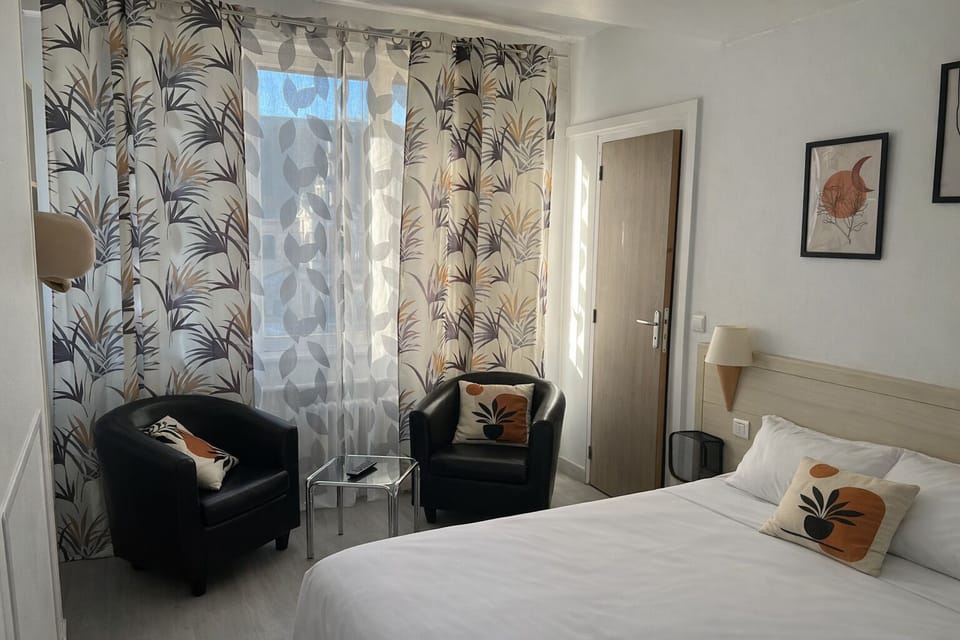 Classic Double Room | Blackout drapes, iron/ironing board, free WiFi, bed sheets